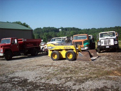 Compost Spreader Trucks and Gehl Loader
